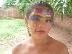 A beautiful student shows her make-up for the show