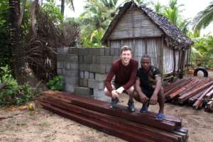 Matthew and Richard With Wood for the Moth Garden
