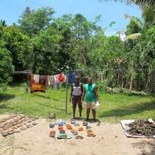 Lydia and Eddie oversee soil preparations