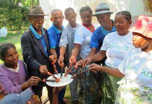 SEPALI Lead Farmers share beetle kabobs