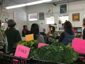 LaDrea, in the far corner, talks to HV interns