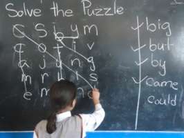 Students use a word puzzle to learn English
