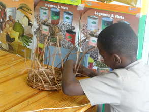Student Making a Basket in Arts and Crafts Section