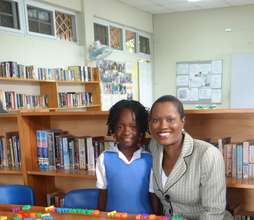 CEF President with a Student in the Center Library