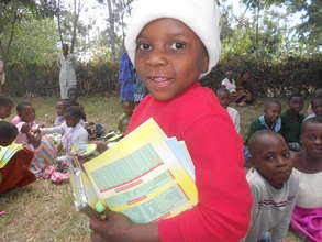 A boy with his new school books