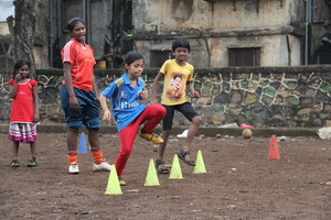 Pooja (blue shirt) joined the team in May