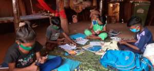 Children busy with the activity kit