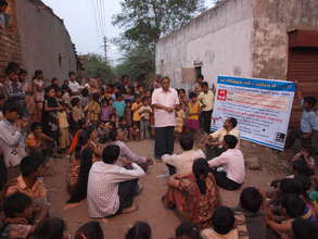 Shaishav staff teach communities about the RTE Act